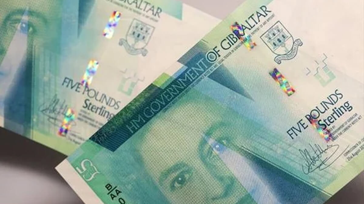 a deep green Gibraltar £5 banknote featuring Queen Elizabeth II