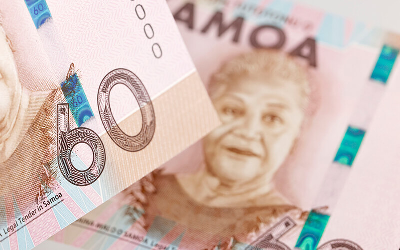 an orange and brown Samoan sixty tala bank note