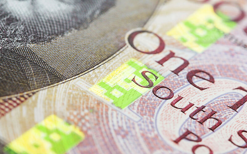 a burgundy and green South Sudanese one thousand shilling bank note