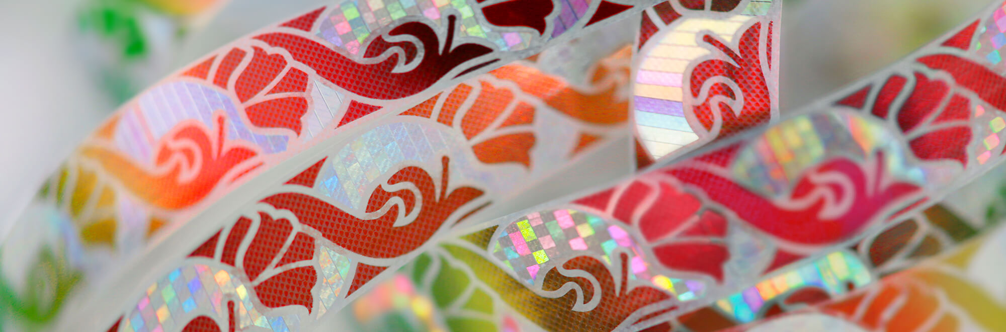 a highly-detailed fluorescent red and orange bank note security thread