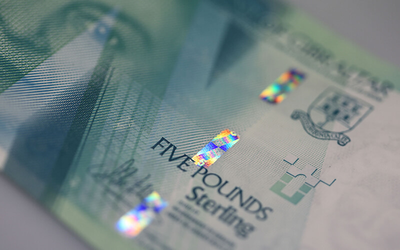 a turquoise five pound Gibraltar bank note
